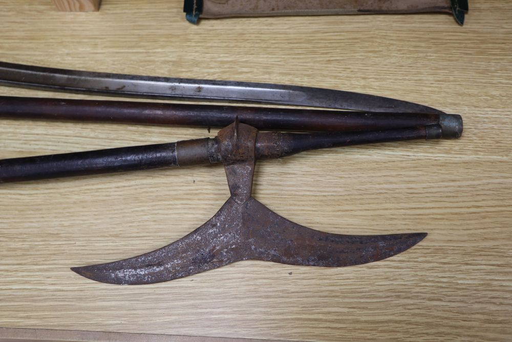 Six bayonets and two axes, largest 99cm